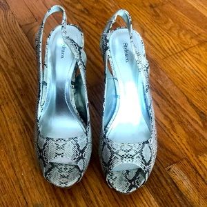 Snake skin sling heel